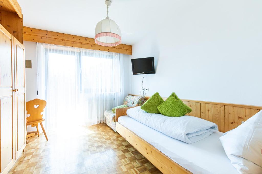 Postel nebo postele na pokoji v ubytování Garni Glurnserhof