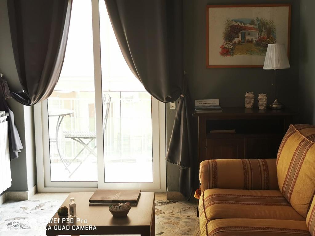 Posezení v ubytování L'ARENA ROOM