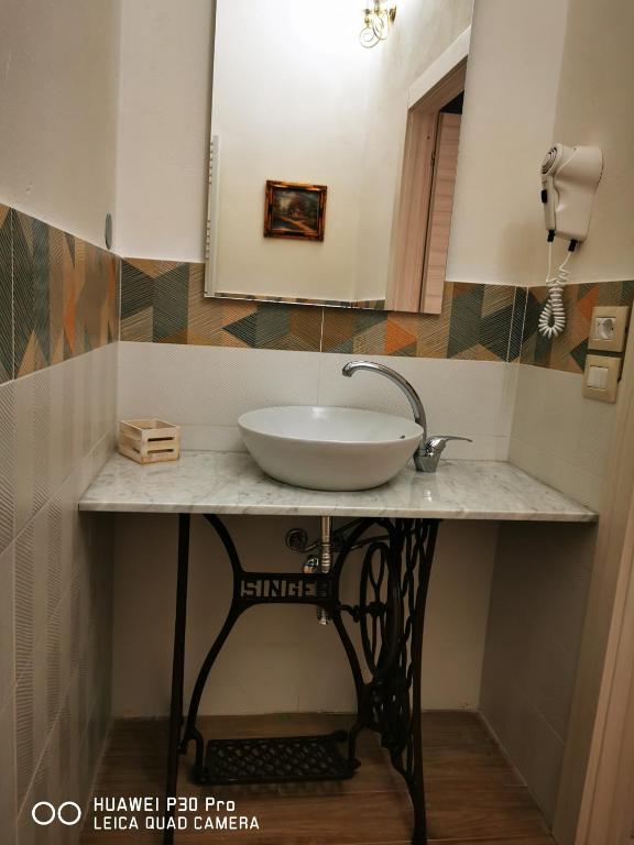 Koupelna v ubytování L'ARENA ROOM