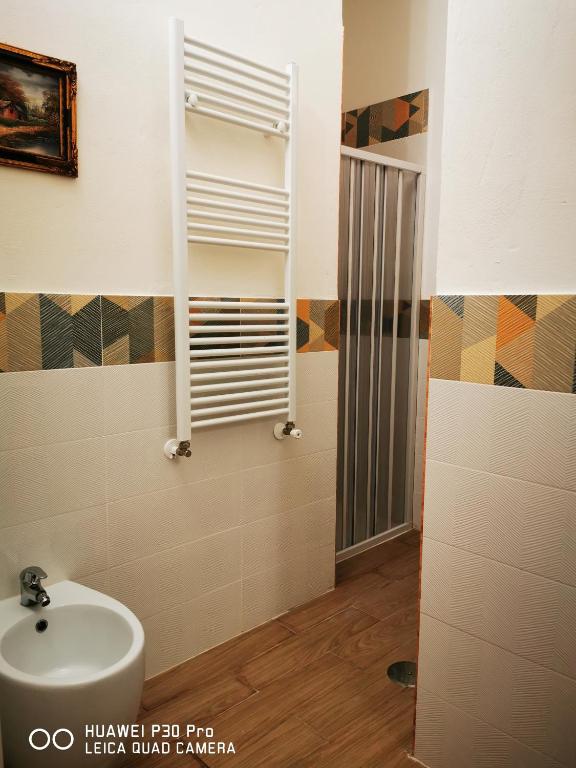 Koupelna v ubytování L'ARENA ROOM