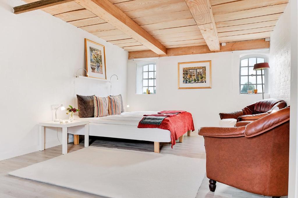 Postel nebo postele na pokoji v ubytování Åløkke BnB