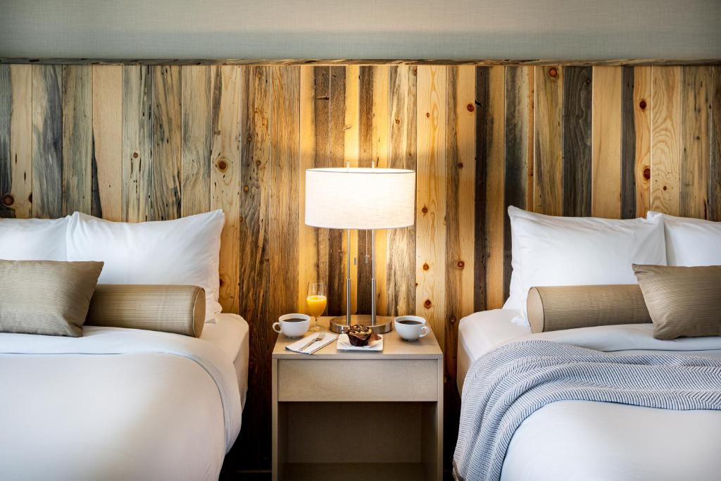 Postel nebo postele na pokoji v ubytování Hotel Maverick