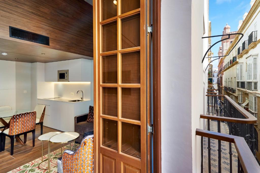 Tandem Torres de Cádiz Suitesにあるバルコニーまたはテラス