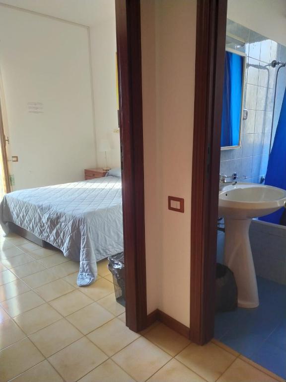 Llit o llits en una habitació de Domus Getsemani
