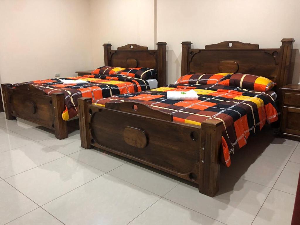 Postel nebo postele na pokoji v ubytování Hospedaje Adrimaran