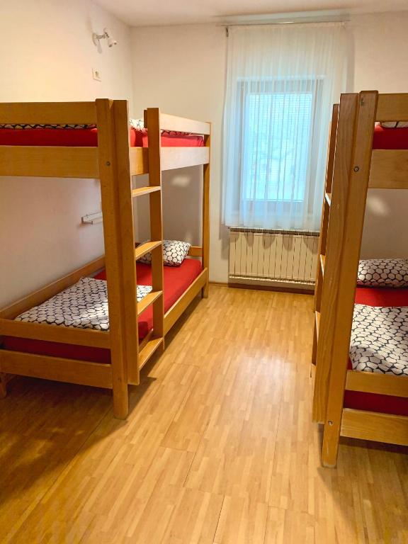 Postel nebo postele na pokoji v ubytování Hostel Vrba