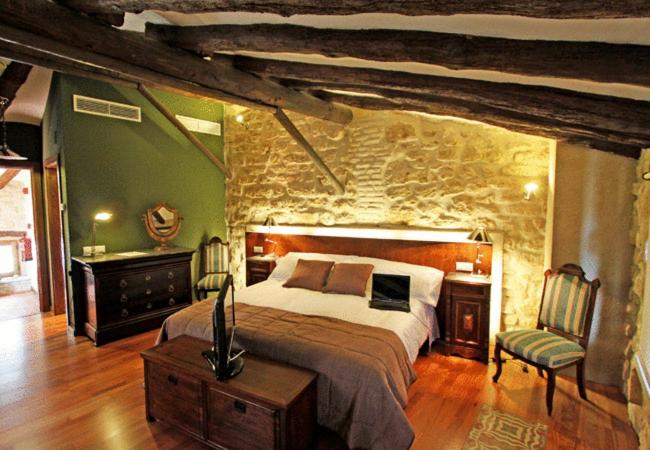 Postel nebo postele na pokoji v ubytování Hotel del Sitjar