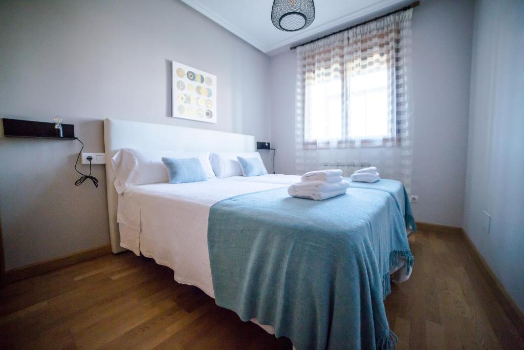 A bed or beds in a room at VUT Puro Sueño (Zurguen)