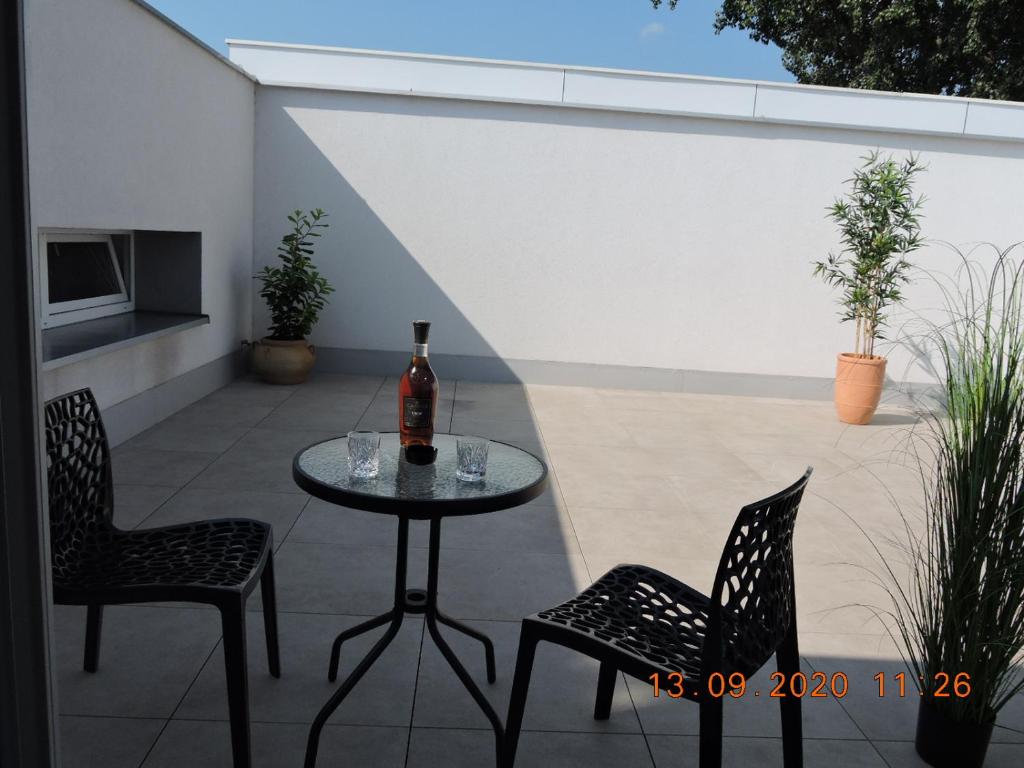 A patio or other outdoor area at Primma Hotel