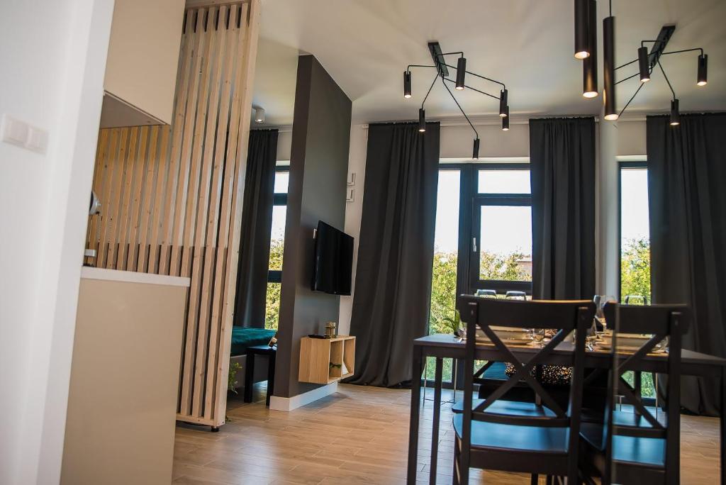 Telewizja i/lub zestaw kina domowego w obiekcie EASY RENT Apartments -BUSINESS CENTER 39