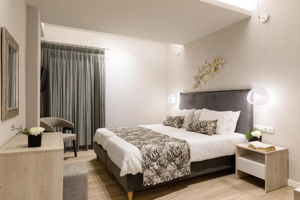 Postel nebo postele na pokoji v ubytování Melina Oasis Boutique Hotel