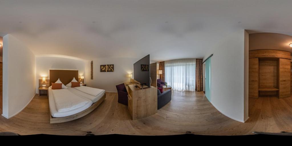 Postel nebo postele na pokoji v ubytování Hotel Spechtshaardt