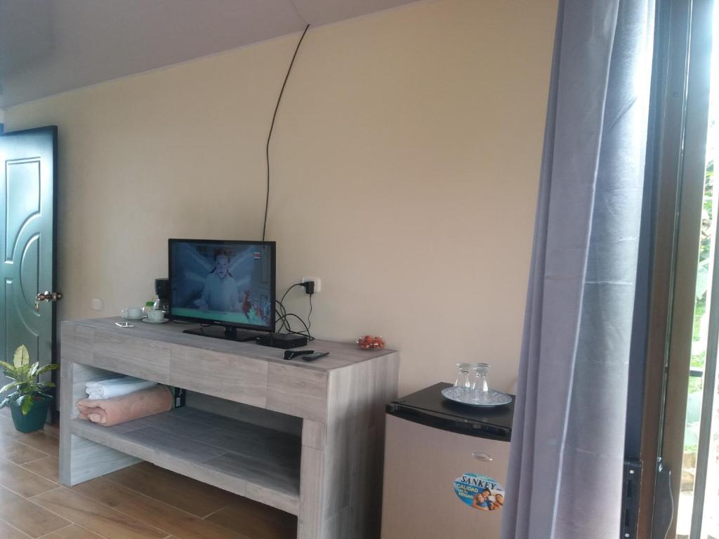 TV a/nebo společenská místnost v ubytování Quinta los volcanes