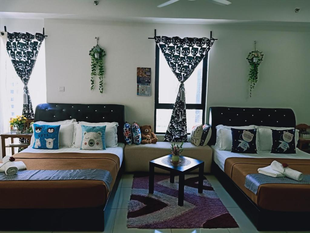 Postel nebo postele na pokoji v ubytování D'Gunduls Homestay STUDIO by DGH I-CITY
