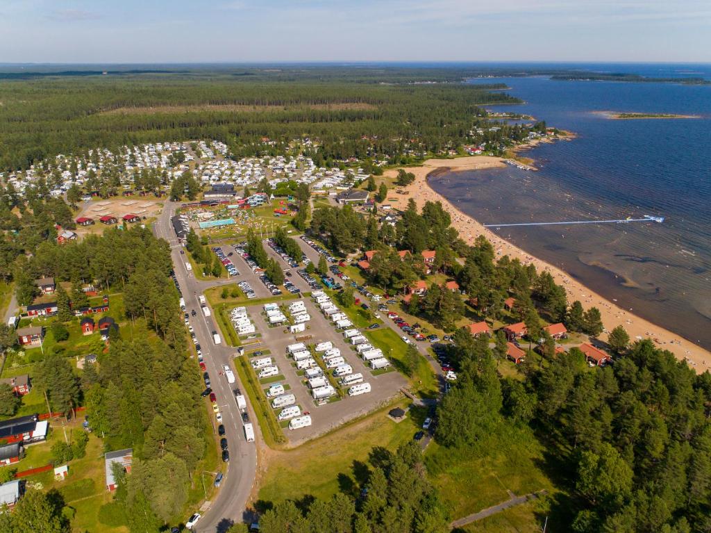 an aerial view of a parking lot next to a beach at Byske Havsbad in Byske