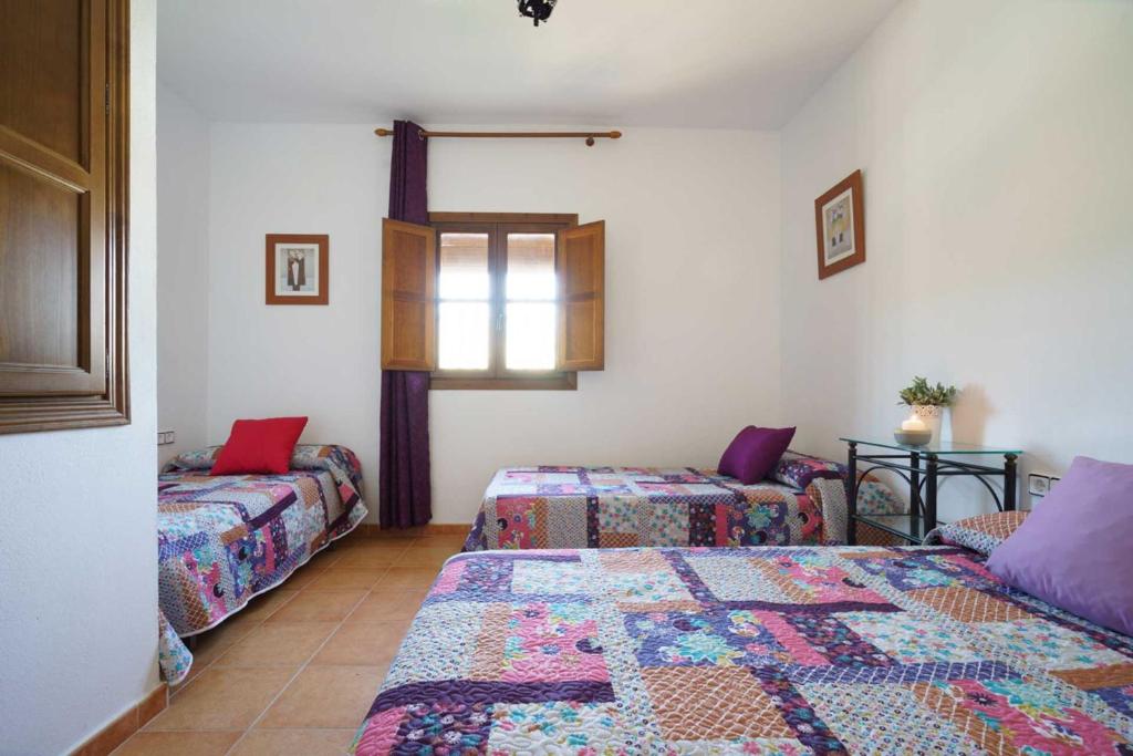 Posteľ alebo postele v izbe v ubytovaní Loma Méndez Casa 3