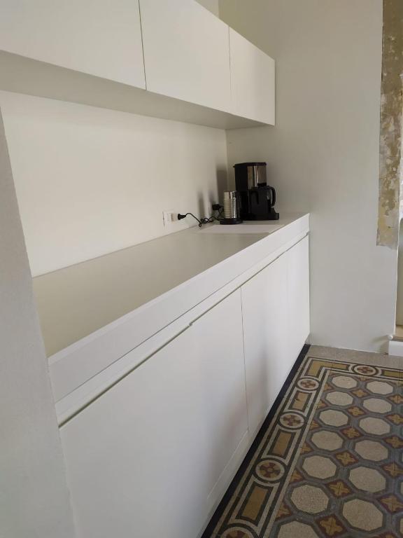 Kuchyň nebo kuchyňský kout v ubytování B&B Suite 44
