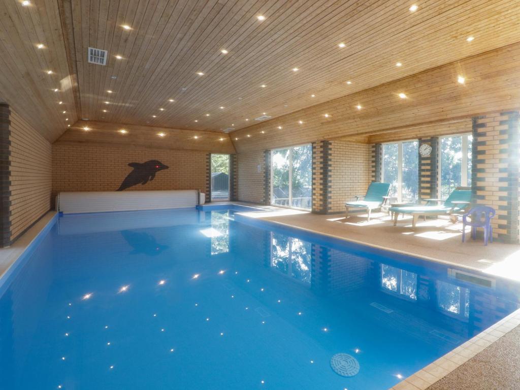 a large swimming pool in a house at The Croft in Vowchurch