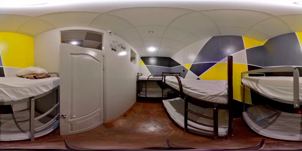 Postel nebo postele na pokoji v ubytování Yourhostel Университет