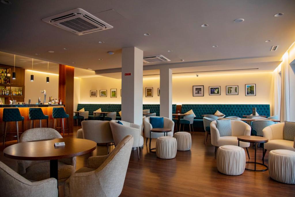 Uma rea de estar em Luna Hotel de Tbua