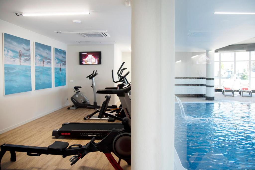 O centro de fitness e/ou as comodidades de fitness de Luna Hotel de Tbua