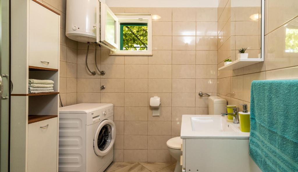 Kúpeľňa v ubytovaní House Simani