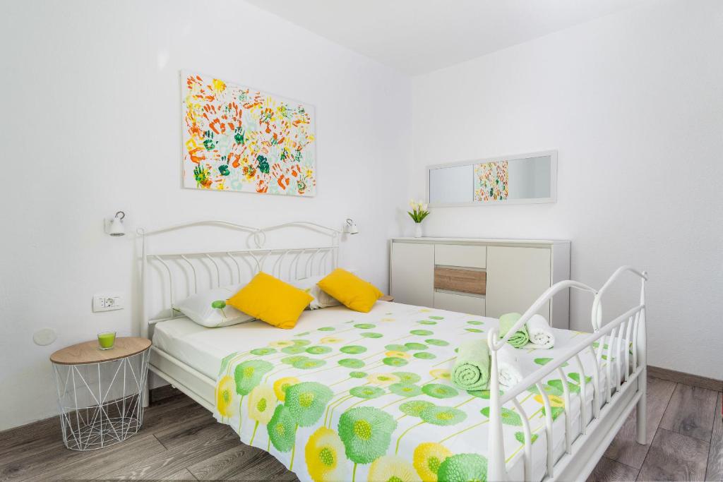 Posteľ alebo postele v izbe v ubytovaní House Simani