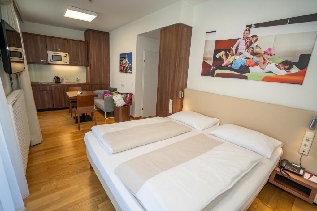 Postel nebo postele na pokoji v ubytování Appartementhaus Karawankenhof