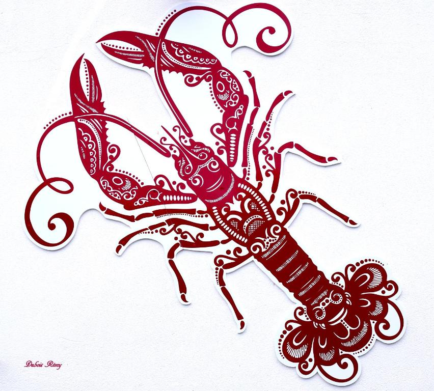 un disegno di un’aragosta in rosso di Au bout de la jetée a Le Guilvinec