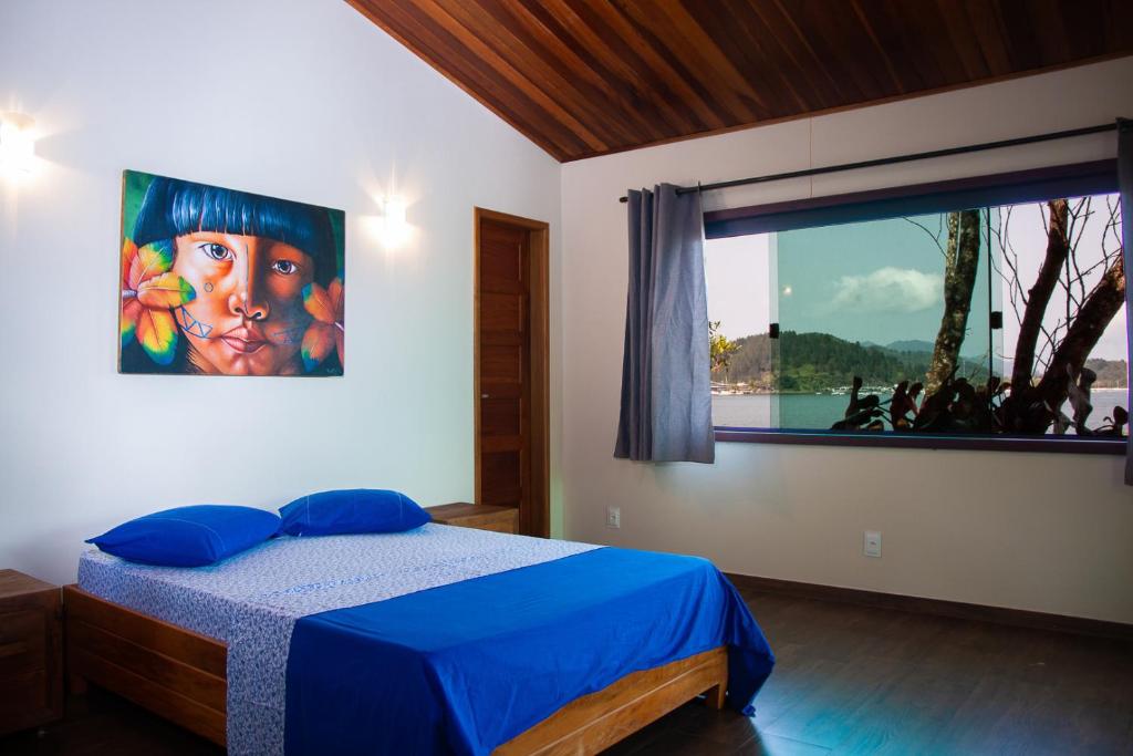 Postel nebo postele na pokoji v ubytování Pousada e Restaurante Mangue Seco Angra