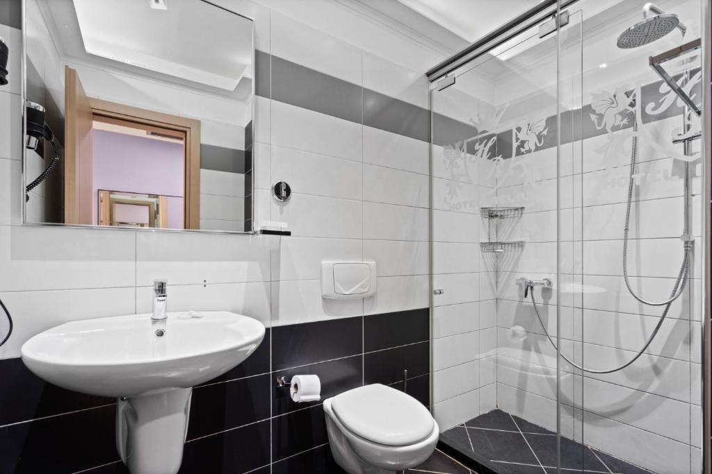 Koupelna v ubytování Hotel Relax