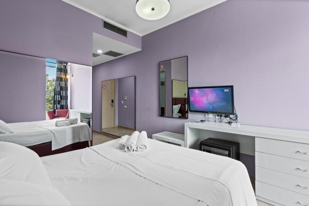 TV a/nebo společenská místnost v ubytování Hotel Relax