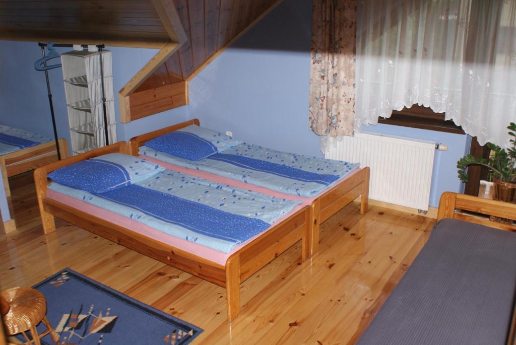 Postel nebo postele na pokoji v ubytování Agrogosia