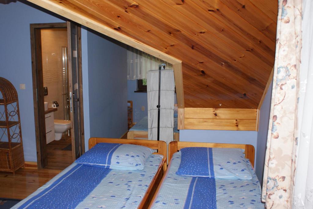 Postel nebo postele na pokoji v ubytování Agrogosia