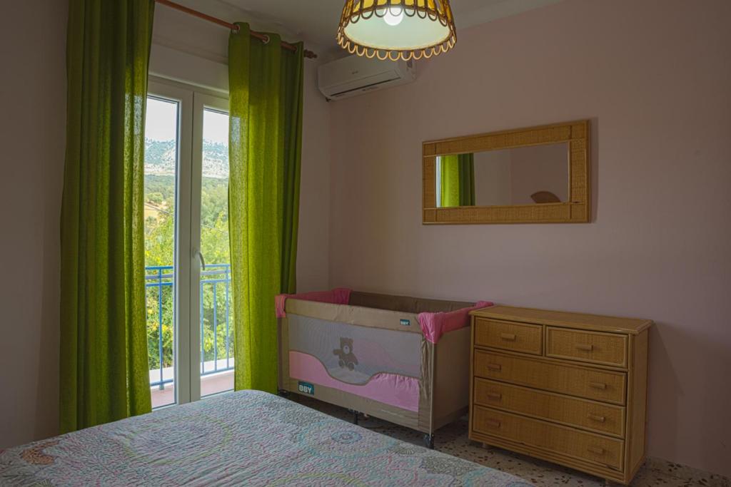 Postel nebo postele na pokoji v ubytování Casa Rural El Níspero