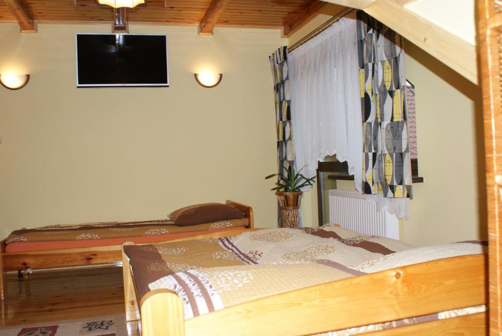 Postel nebo postele na pokoji v ubytování Agrogosia
