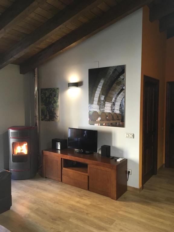 TV a/nebo společenská místnost v ubytování La Casa del Vino