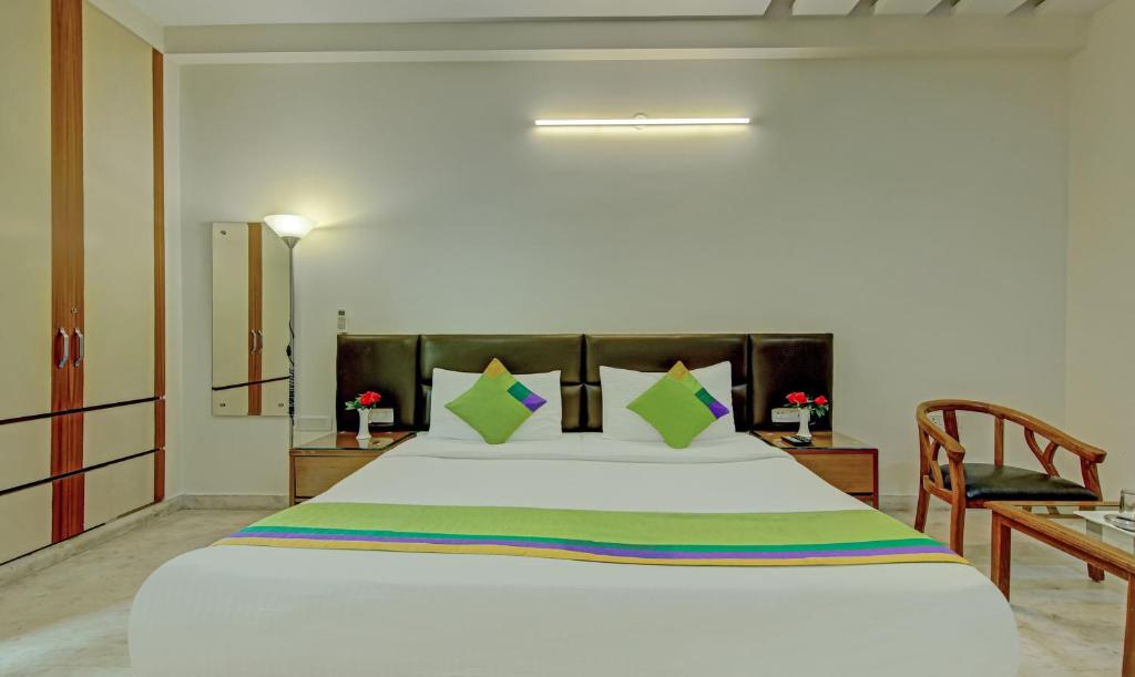 Postel nebo postele na pokoji v ubytování Itsy Hotels Swastika Inn Sector 26