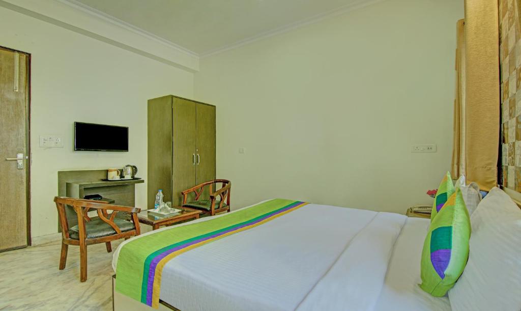TV a/nebo společenská místnost v ubytování Itsy Hotels Swastika Inn Sector 26