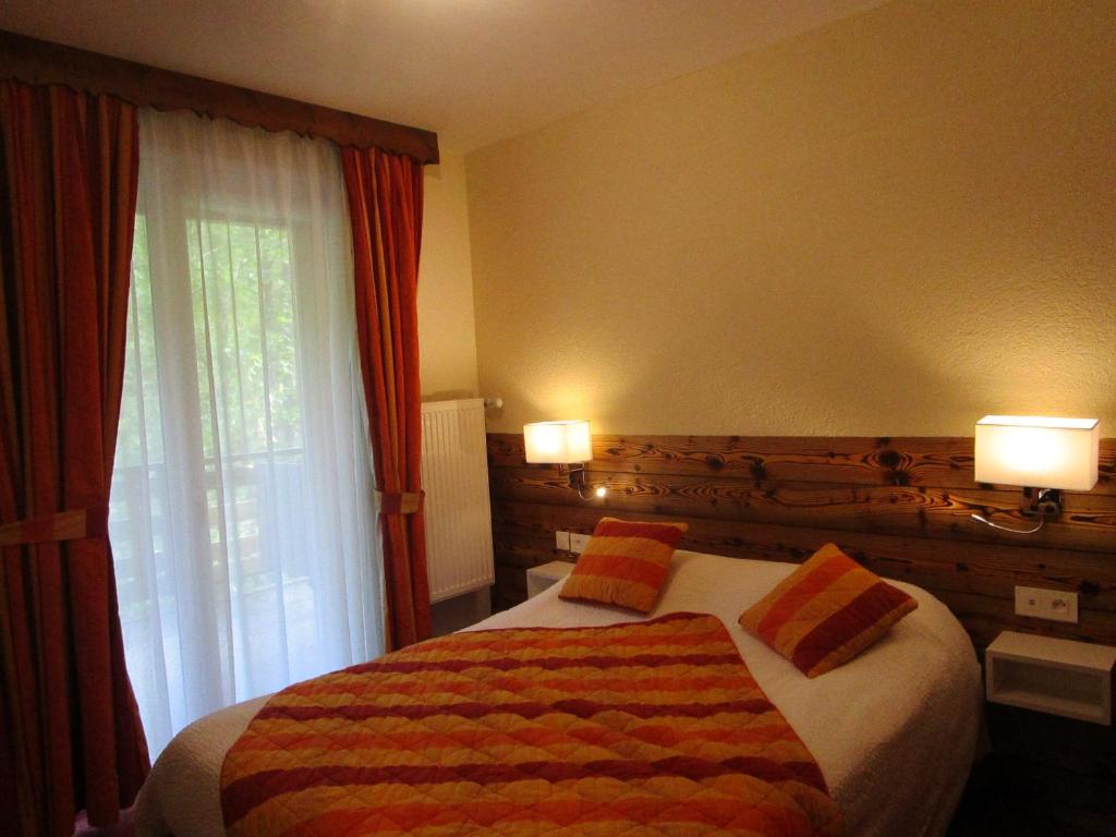 Postel nebo postele na pokoji v ubytování Auberge de la Dranse