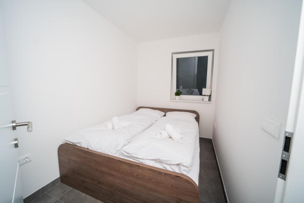 Postel nebo postele na pokoji v ubytování Villa Lara Terme Čatež 6 Thermal Riviera Tickets