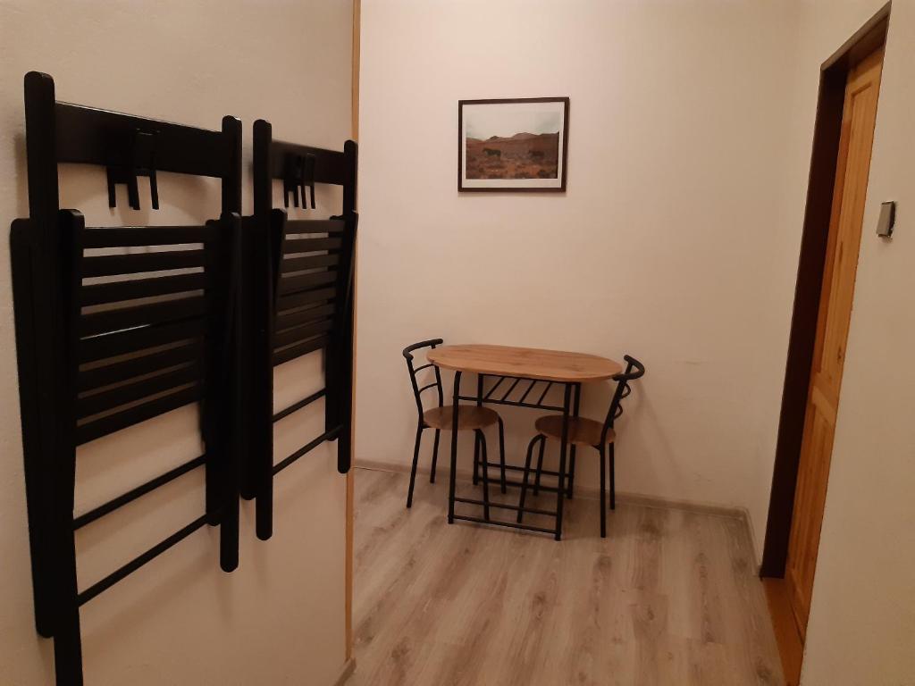 Postel nebo postele na pokoji v ubytování Penzion u Hradilů