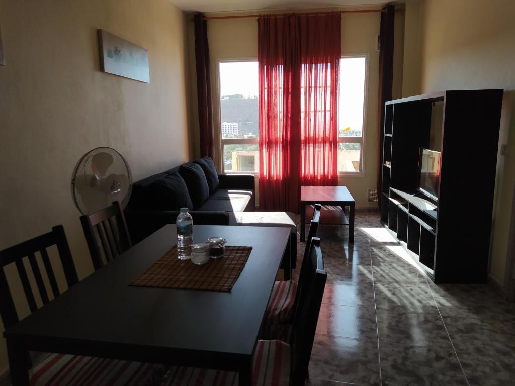 A seating area at apartamentos la villa 2