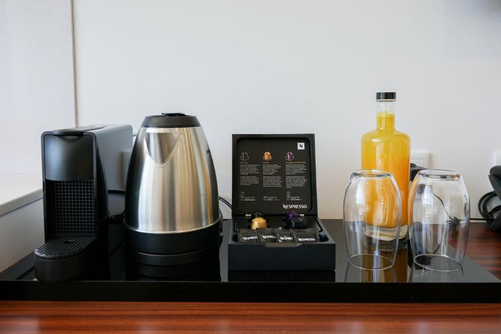 Comodidades para chá e café em Portovella Lodges & Bungalows
