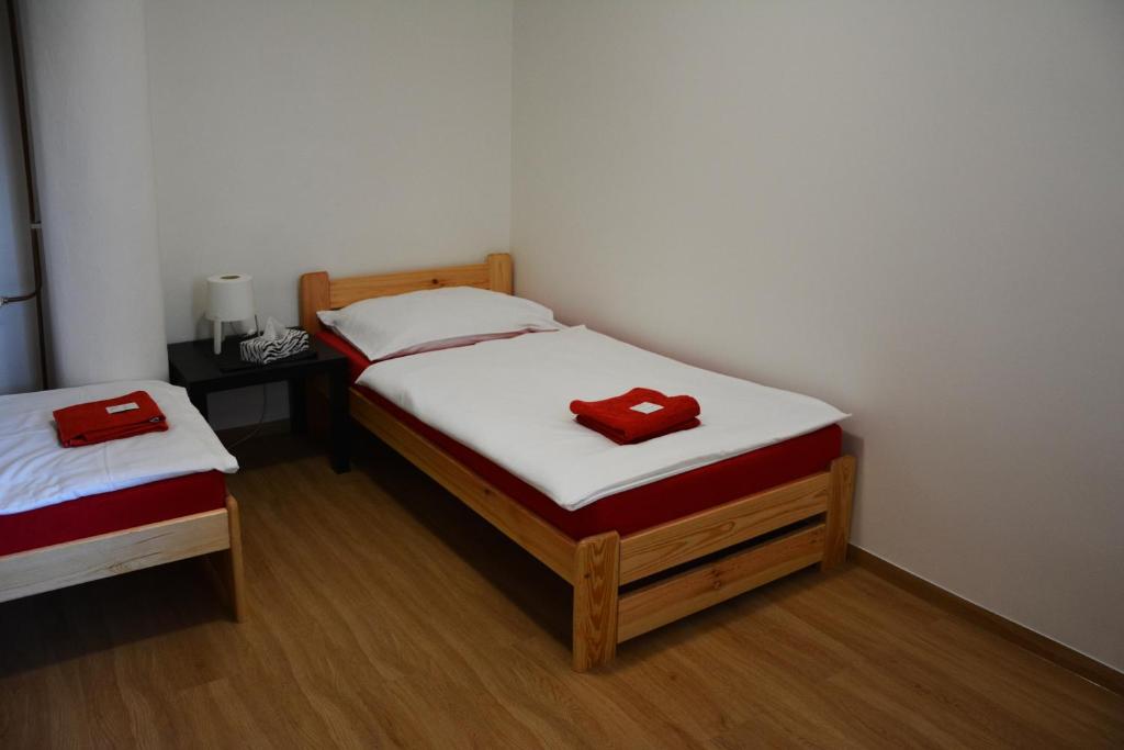 Postel nebo postele na pokoji v ubytování Penzion Locanda