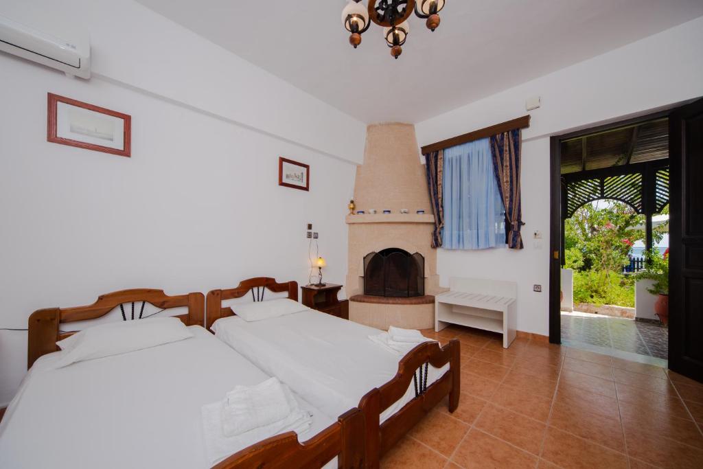 A bed or beds in a room at Stegnailion