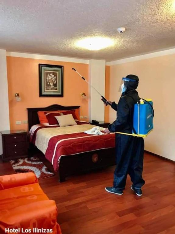 Postel nebo postele na pokoji v ubytování Hotel Los Ilinizas