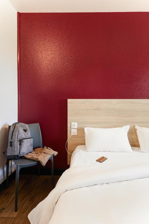 Postel nebo postele na pokoji v ubytování hotelF1 Annemasse Hotel Renove