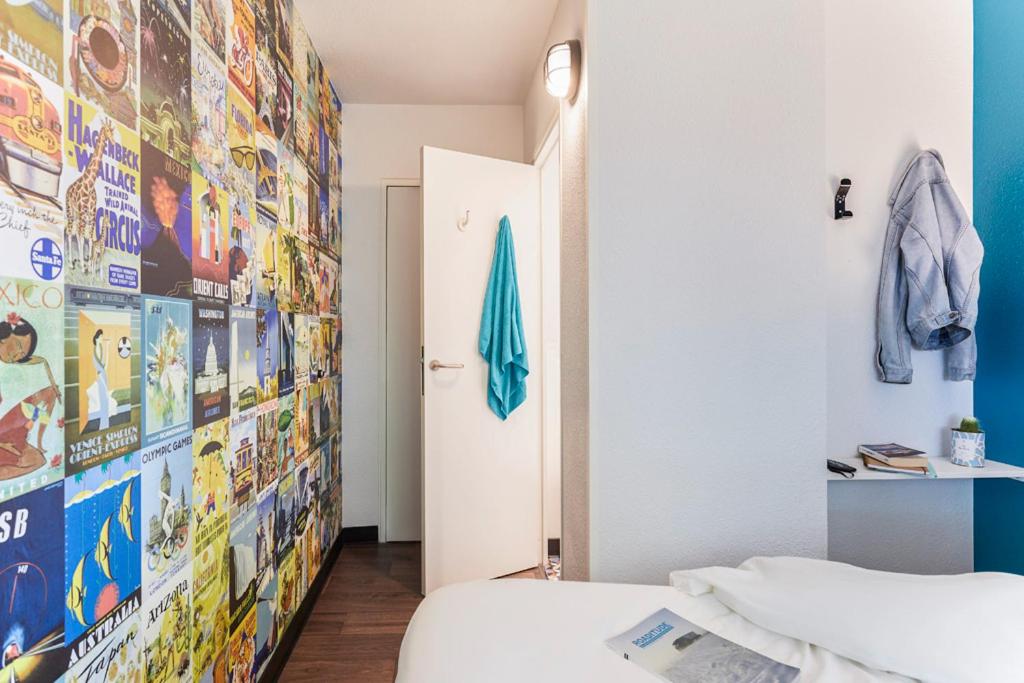Postel nebo postele na pokoji v ubytování hotelF1 Annemasse Hotel Renove