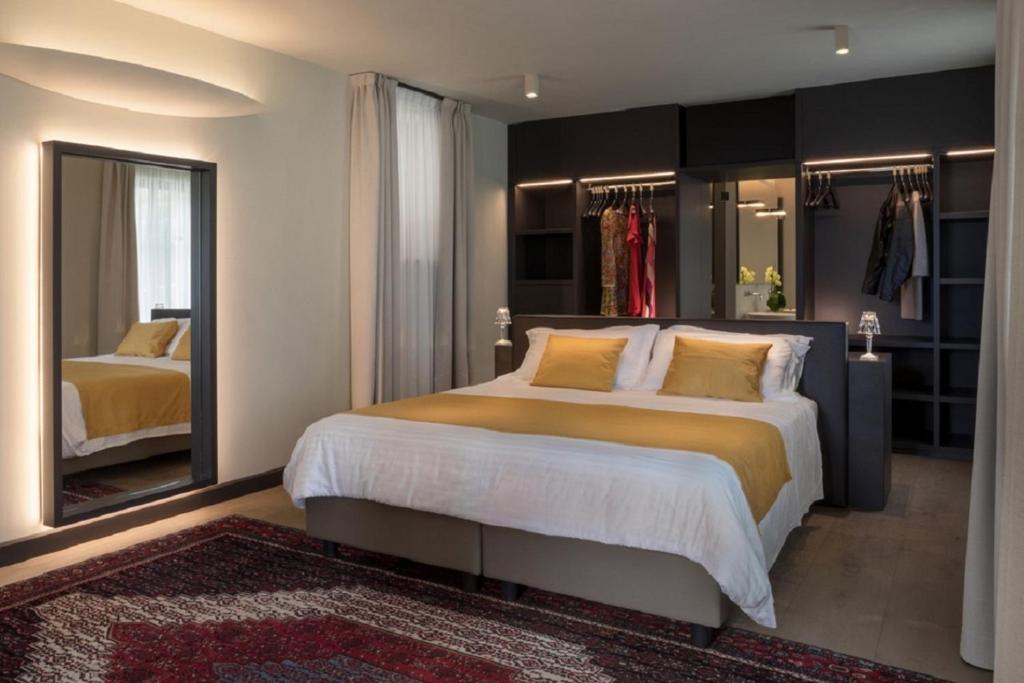 Postel nebo postele na pokoji v ubytování Hotel Villa Giulia
